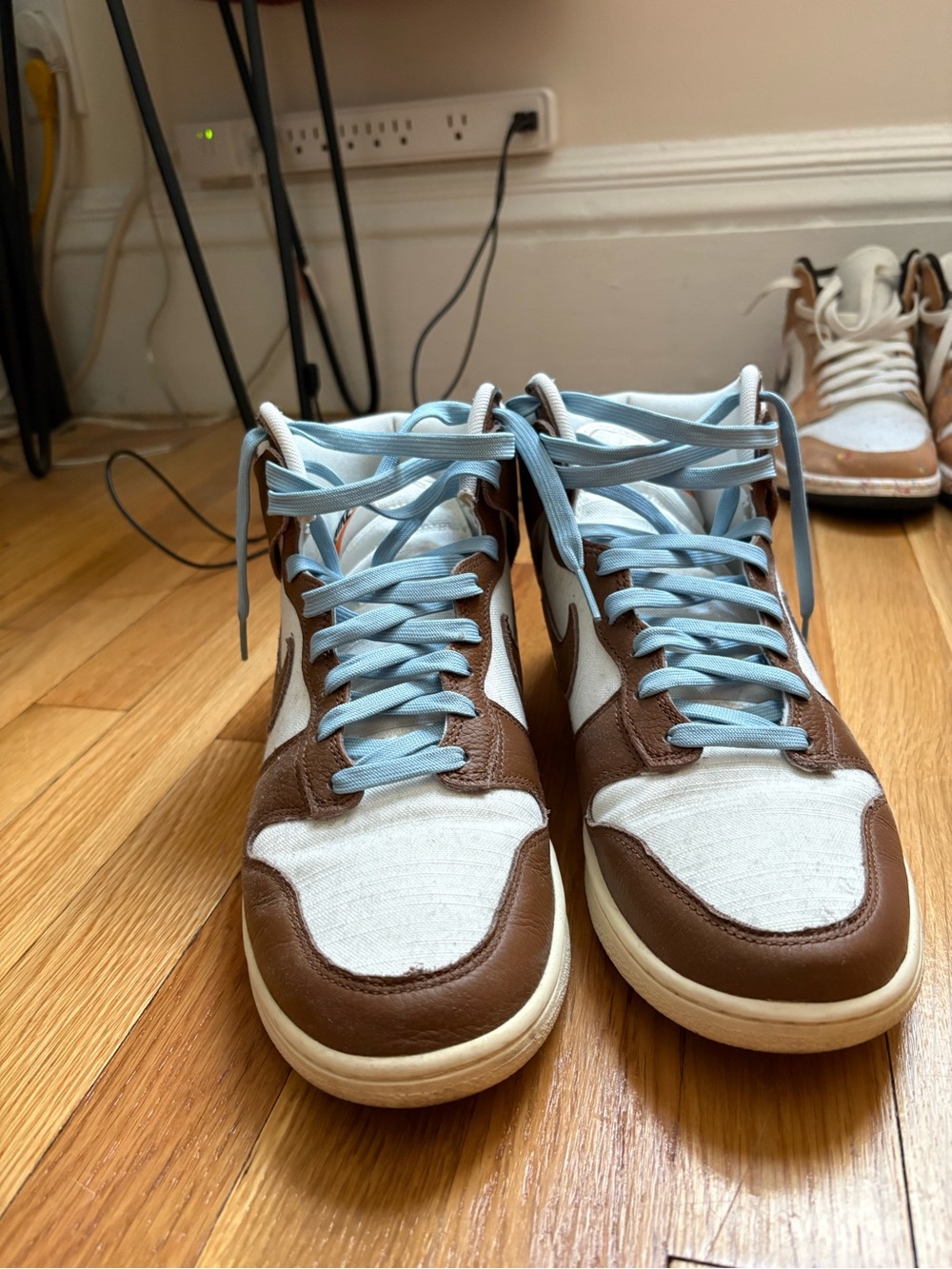 Brown and White High-Top Sneakers with Light Blue Laces
